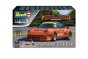 Revell 1/24 scale Porsche 934 RSR Jägermeister model kit box showing the orange race car on a track with included paints, glue, and brush.
