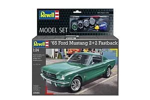 Revell 1/24 scale 1965 Ford Mustang 2+2 Fastback plastic model starter kit box, featuring a green car illustration and included paint and glue.