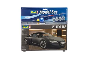 Revell 1/24 scale Audi R8 plastic model kit in original blister packaging, including paint, glue, and a brush.