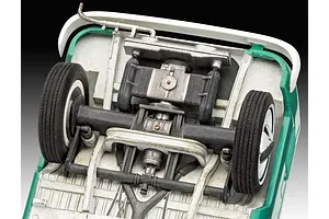 Underside view of a 1/24 scale Revell VW T1 Bus model kit showing detailed chassis, engine, and suspension components.