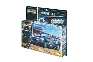 Revell 1/25 scale '62 Shelby Cobra 289 model kit in blister packaging, including paints, glue, and a brush.