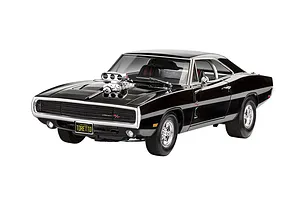 A 1/25 scale model of Dominic Toretto's black 1970 Dodge Charger R/T from Fast &amp; Furious, featuring a prominent chrome supercharger protruding from the hood.
