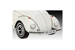 Close-up of the front end of a white scale model Volkswagen Beetle with a license plate reading WD-EZ 60.