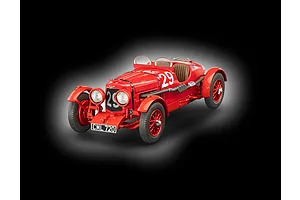 A red Revell 1/32 scale Aston Martin Ulster model car with number 29 on the side and front, featuring a black license plate CML 720.