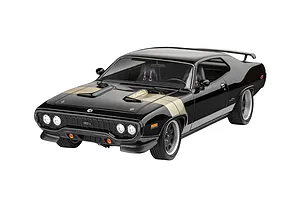 A 1/24 scale plastic model of a black 1971 Plymouth GTX with gold hood stripes, viewed from the front three-quarter angle against a white background.
