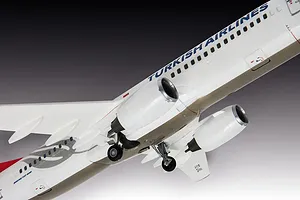 A detailed scale model of a Turkish Airlines Boeing 737-800 aircraft viewed from below, showing the fuselage, wings, engines, and landing gear.