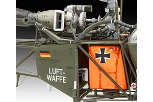 Close-up of a detailed Revell 1/32 scale Alouette II helicopter model showing the engine, frame, and Luftwaffe markings.