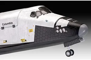 Close-up of the nose section of a Revell 1/72 scale Space Shuttle Columbia plastic model kit, showing detailed tile patterns and landing gear.
