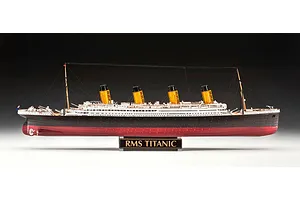A side-profile studio shot of a fully assembled Revell 1/400 scale RMS Titanic model ship, mounted on a black display stand with the nameplate RMS TITANIC.
