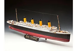 A fully assembled 1/400 scale plastic model of the RMS Titanic, featuring black hull, red bottom, and four yellow funnels, displayed on a stand.