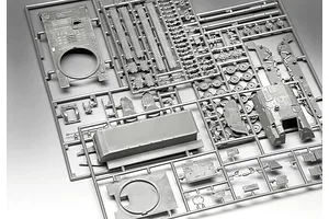 A grey plastic sprue containing various unpainted parts for a 1/72 scale Panzerhaubitze 2000 model kit, including hull, turret, and track sections.