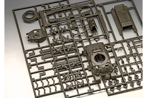 A plastic model kit sprue containing various parts for a 1/72 scale Sherman M4A1 tank, including the hull, turret, and track segments.