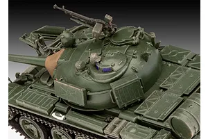 A close-up, high-angle view of an assembled and painted 1/72 scale T-55A tank model, showing the turret, main gun, and machine gun.