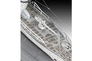 Close-up of the deck of a 1/144 scale U-boat model, showing the deck gun, railings, and textured deck plating.