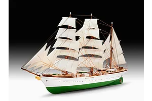 A fully assembled 1/350 scale plastic model of the Gorch Fock sailing ship, featuring white sails, a white and green hull, and detailed rigging.