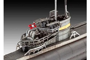 Close-up of the conning tower of a 1/350 scale Revell German Type VII C/41 submarine model, showing detailed railings, deck guns, and a small flag.
