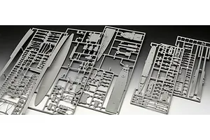 Three grey plastic model kit sprues containing various ship parts for a 1/700 scale model set.