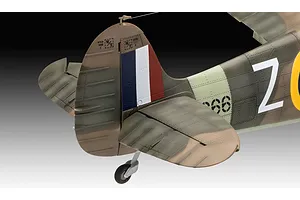 Close-up of the tail section of a 1/32 scale Revell Spitfire Mk.II model, showing camouflage paint, RAF markings, and the tail wheel.