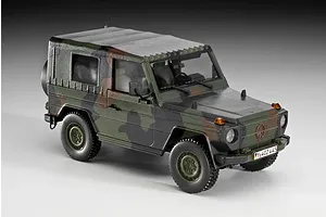 A fully assembled and painted 1/35 scale plastic model of a German military Wolf truck in camouflage paint.