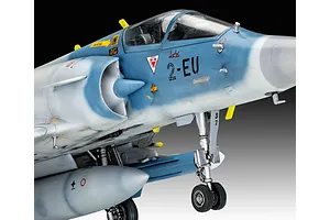 Close-up of a 1/48 scale Revell Dassault Mirage 2000 C plastic model aircraft showing the cockpit, nose, and landing gear.