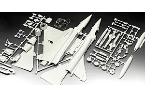 Unassembled plastic model kit parts for a Dassault Mirage 2000 C fighter jet, including fuselage halves, wings, and weapons on grey sprues.