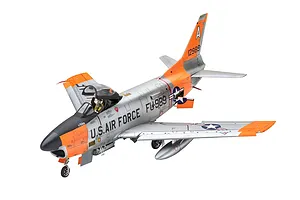 A completed 1/48 scale plastic model of a US Air Force F-86D Sabre Dog jet, painted in silver and high-visibility orange with pilot figure inside.