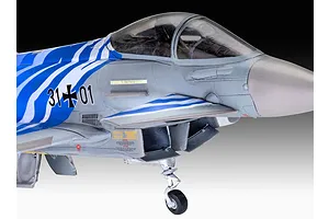 A close-up view of a 1/72 scale plastic model of a Eurofighter Typhoon with Bavarian Tiger 2021 livery, showing the cockpit and nose section.