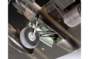 Close-up view of the landing gear and wheel well of a scale model Lancaster bomber, showing detailed mechanical parts and painted surfaces.