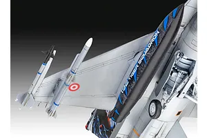Close-up of a 1/72 scale plastic model F-16D fighter jet showing the underside of the wing, missiles, and landing gear.