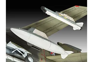 Close-up of a 1/72 scale plastic model Panavia Tornado aircraft showing the underside, landing gear, and external fuel tank.