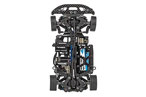 Top-down view of a Team Associated 1/28 scale RC touring car chassis showing carbon fiber components, motor, battery, and electronics.