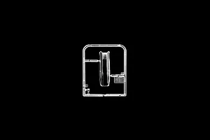A single clear plastic sprue containing a canopy part for an Italeri 1/72 scale AH-1W Super Cobra model kit against a black background.
