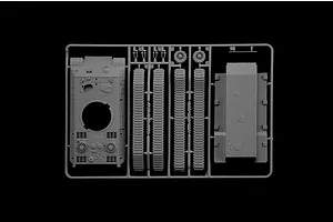A grey plastic sprue containing parts for a 1/56 scale model tank, including the hull, turret, and track sections, isolated on a black background.