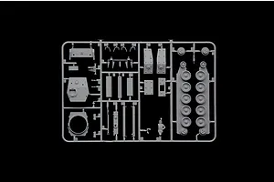 A grey plastic sprue containing various tank model parts, including road wheels, turret components, and a small figure, set against a black background.