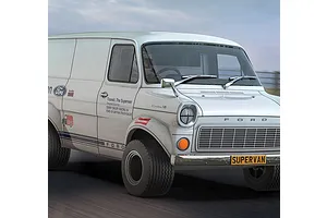 A 1/32 scale Scalextric Ford Transit Mk 1 Supervan slot car in white with racing decals, shown in a dynamic motion blur setting.