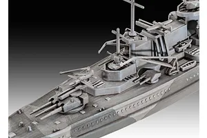 Close-up of a 1/1200 scale plastic model of the Gneisenau battleship, showing the deck, gun turrets, and superstructure details.