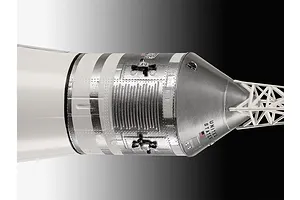 Close-up of the silver and white command module section of a Revell Saturn V rocket model kit.