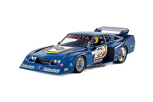 A studio shot of a fully assembled and painted Tamiya 1/24 scale Toyota Celica LB Turbo Gr.5 model car in blue with Rodenstock racing livery.