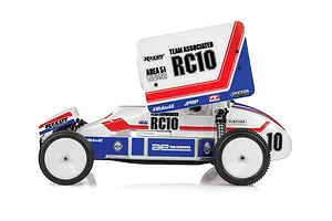 Side profile of a Team Associated RC10 Sprint RC car featuring a white, red, and blue livery with prominent RC10 and Reedy Power branding.