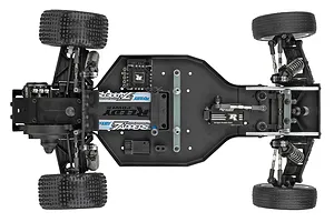 Top-down view of a Team Associated RC10 Sprint car chassis showing the internal components, battery, and tires on a white background.