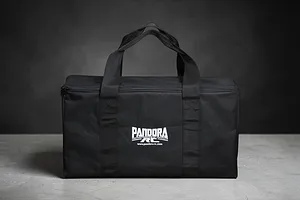 A black Pandora RC branded equipment bag sitting on a grey surface against a dark background.