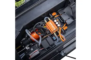 Internal view of the Pro Boat Sonicwake V3 RC boat showing the orange brushless motor, ESC with Smart Technology branding, and water cooling tubing.
