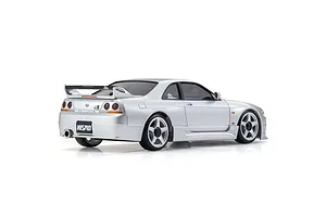 Rear three-quarter view of a silver Kyosho Mini-Z Nissan Skyline GT-R NISMO R33 RC car on a white background.