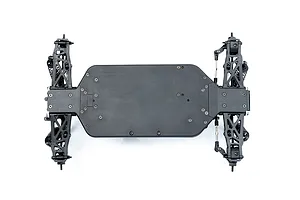 Top-down view of an LRP S10 Blast RC buggy chassis showing the main tub, suspension arms, and shock absorbers on a white background.