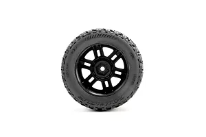 A single Pro-Line 1/16 scale Jaeger MT monster truck tyre mounted on a black split-six wheel, viewed from the front against a white background.