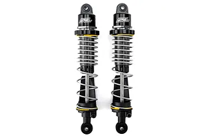 Two Pro-Line PowerStroke black aluminium RC shock absorbers side by side on a white background.