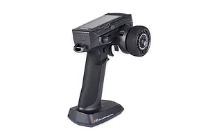 Sense Innovations S10 10-channel RC transmitter with a black pistol-grip design, steering wheel, and digital screen on a white background.