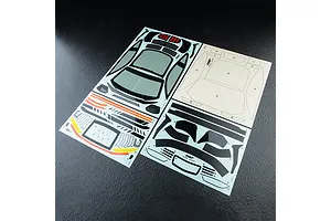 A set of decal sheets for the MST MTRTR RC body shell, featuring window masks, black trim, and orange and yellow accent stickers on a black background.