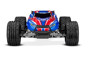 Front view of a Traxxas Rustler RC stadium truck with a red, white, and blue 40th anniversary body shell on a white background.