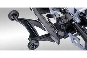 Close-up of the rear wheelie bar assembly on a Traxxas RC monster truck chassis.